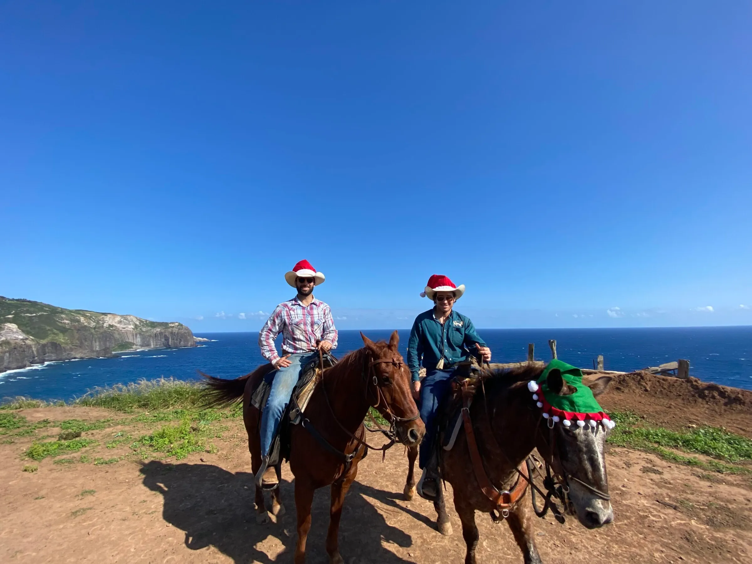 a man riding a horse on a beach